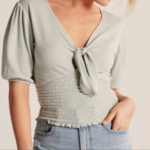 Brand new Black smocked top